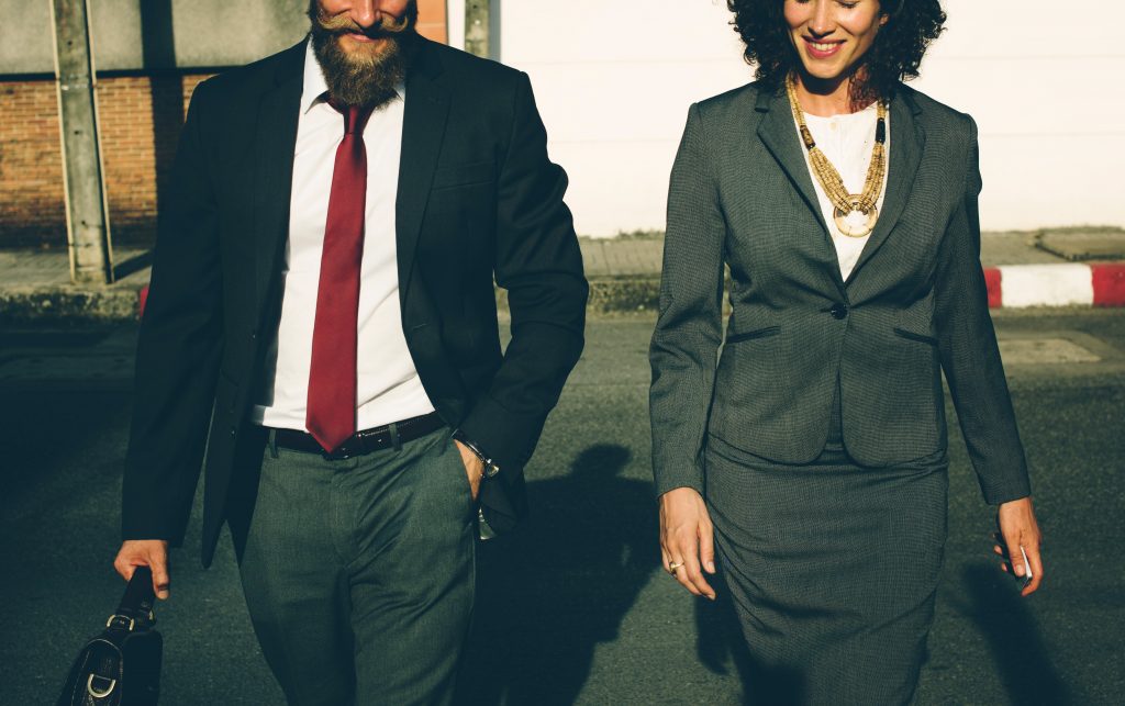 5 Signs That You May Be Smarter Than Your Boss: two associates walking